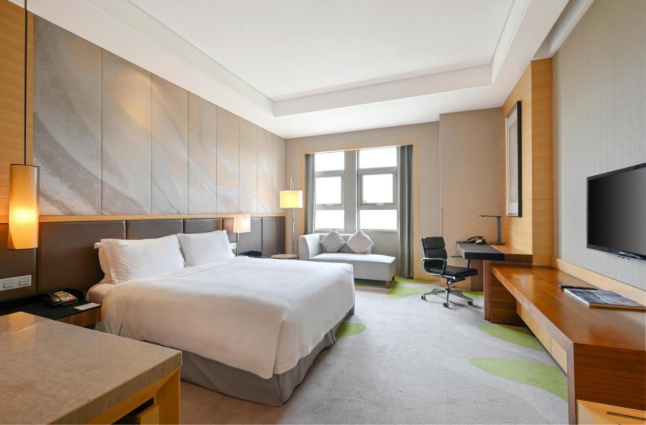 Hai Tian Expo Hotel Циндао Екстериор снимка